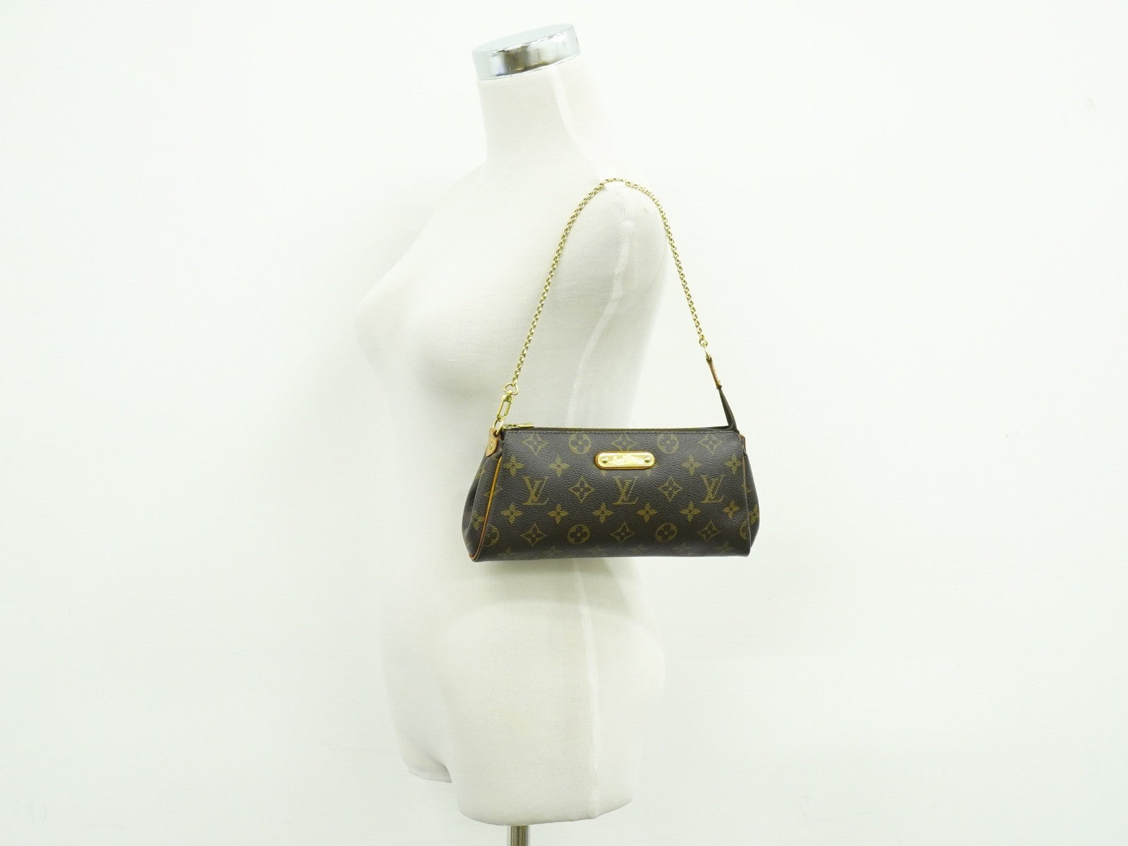 Louis Vuitton Eva Handbag Monogram Canvas Brown Canvas Clutche & Pouche Bag (Pre-Owned)
