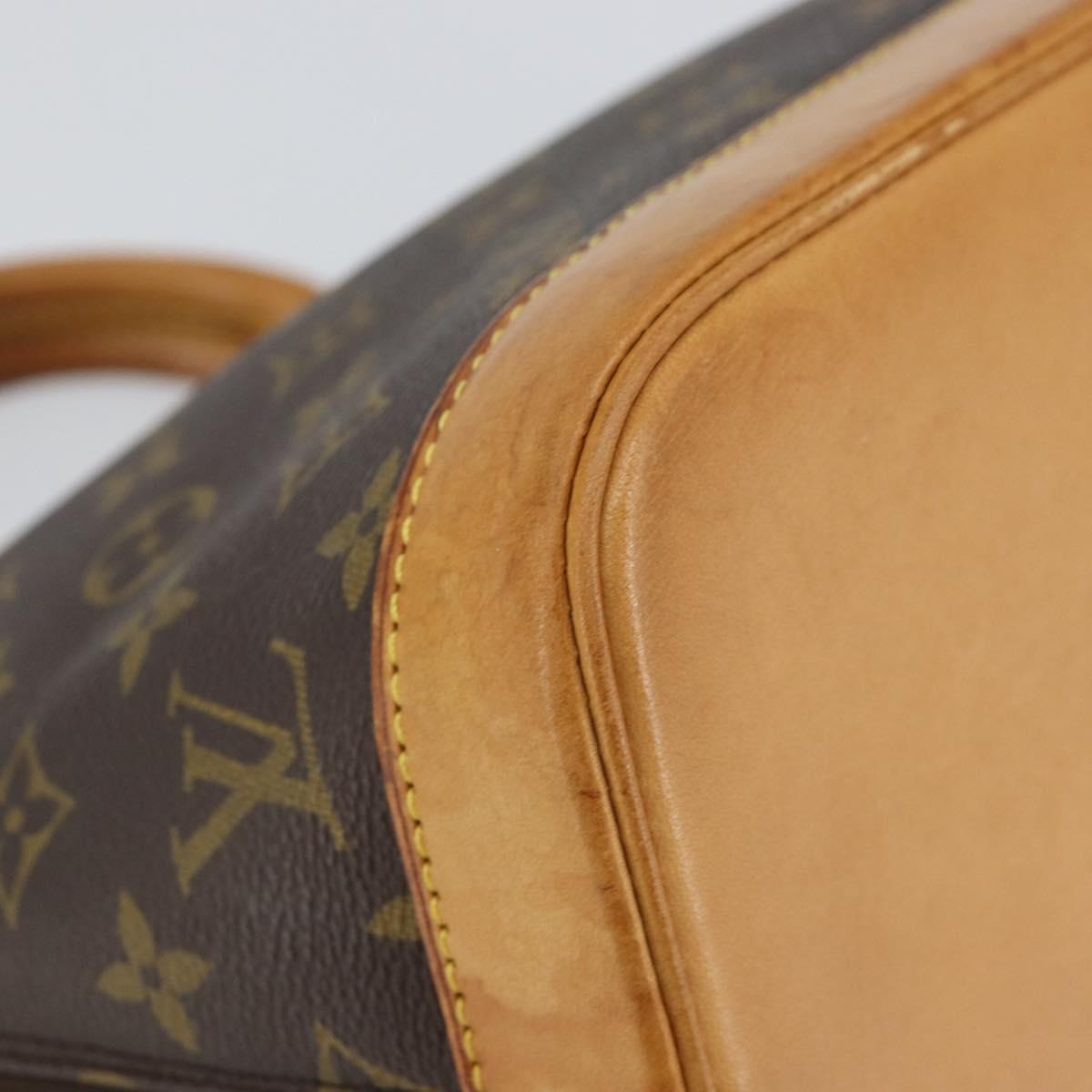 Louis Vuitton Alma Handbag Monogram Canvas Brown Canvas Handbag (Pre-Owned)