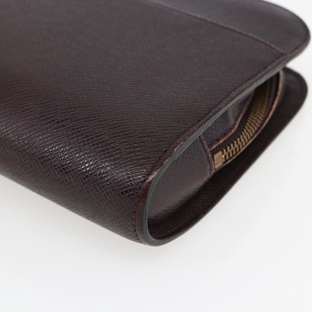 Louis Vuitton Pochette Baikal Clutch Taiga Leather Burgundy Leather Clutche & Pouche Bag (Pre-Owned)