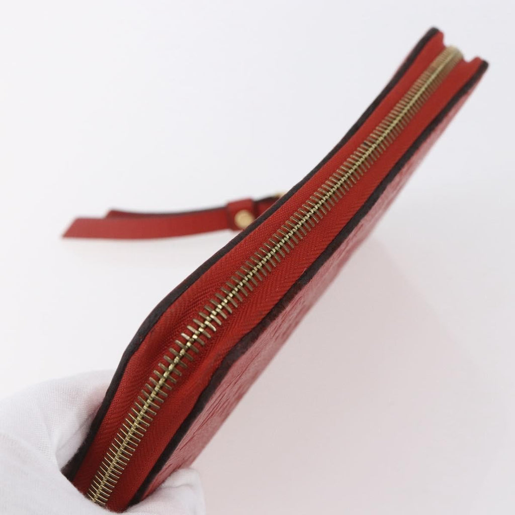Louis Vuitton Portefeuille Zippy Monogramme Empreinte Monogramme Empreinte Red Leather Wallets Accessory (Pre-Owned)