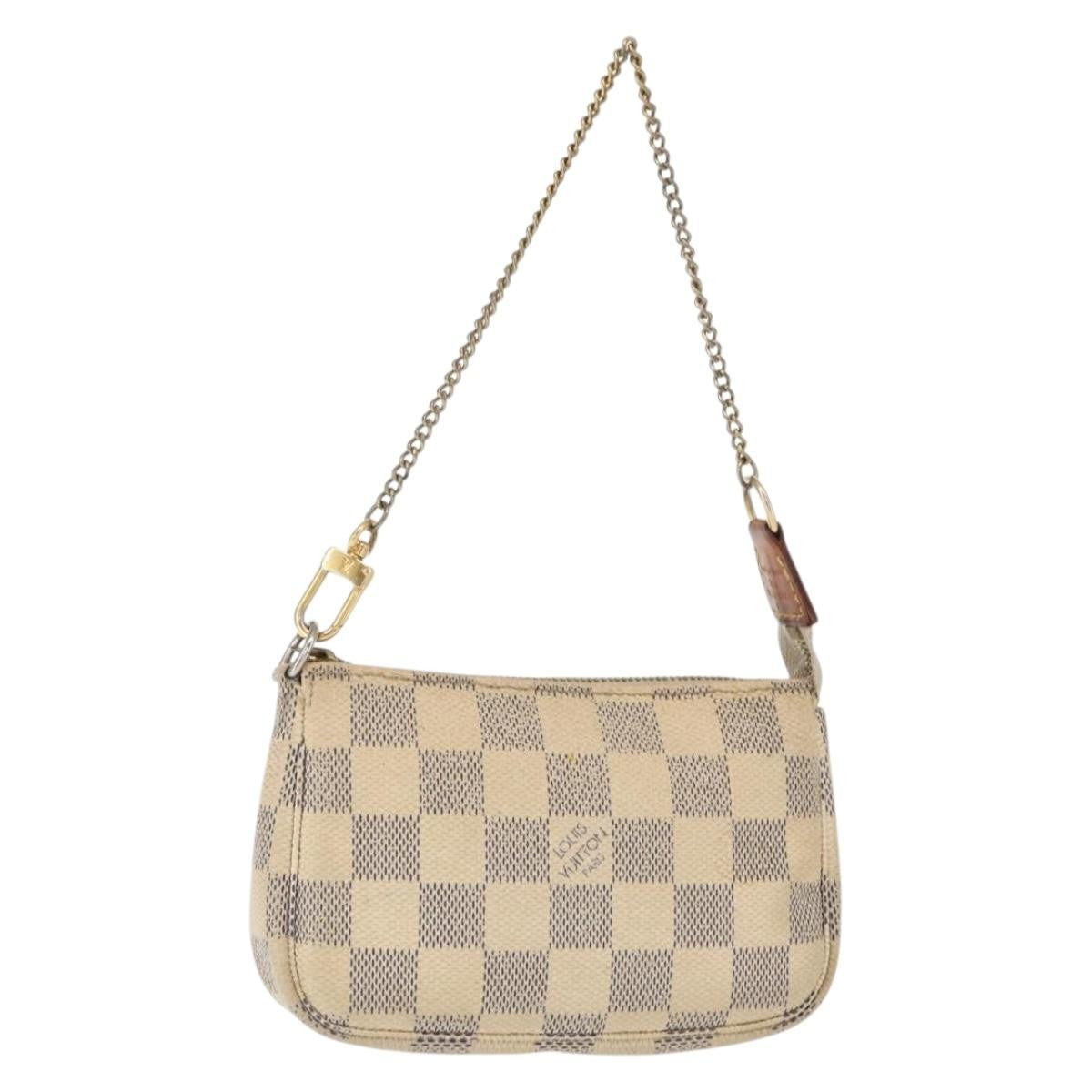 Louis Vuitton Mini Pochette Accessoires Damier Canvas White Canvas Clutche & Pouche Bag (Pre-Owned)
