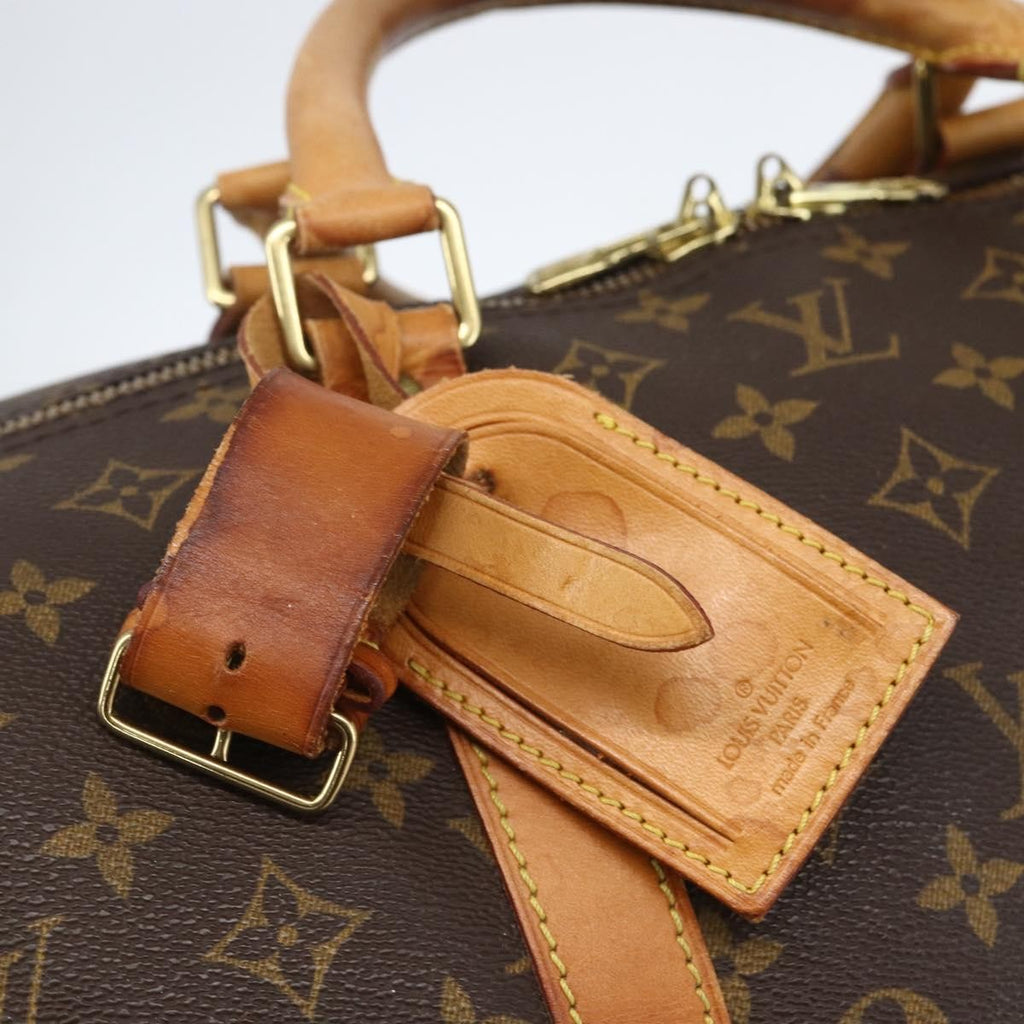 Louis Vuitton Keepall Bag Monogram Canvas Brown Canvas Travel Bag Bag (Pre-Owned)