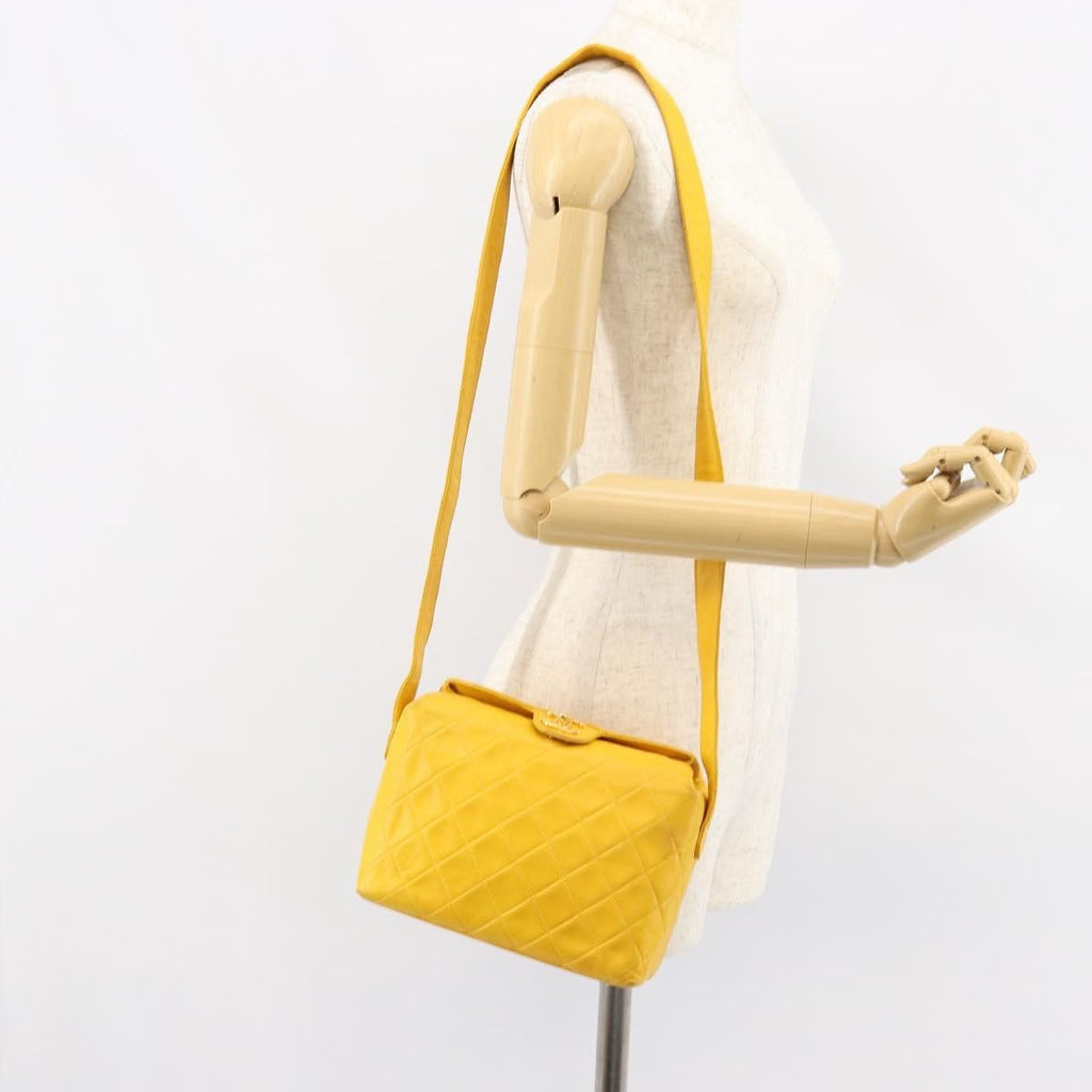Chanel Vintage Cc Fold Over Shoulder Bag Quilted Lambskin Yellow Leather Shoulder Bag Bag (Pre-Owned)