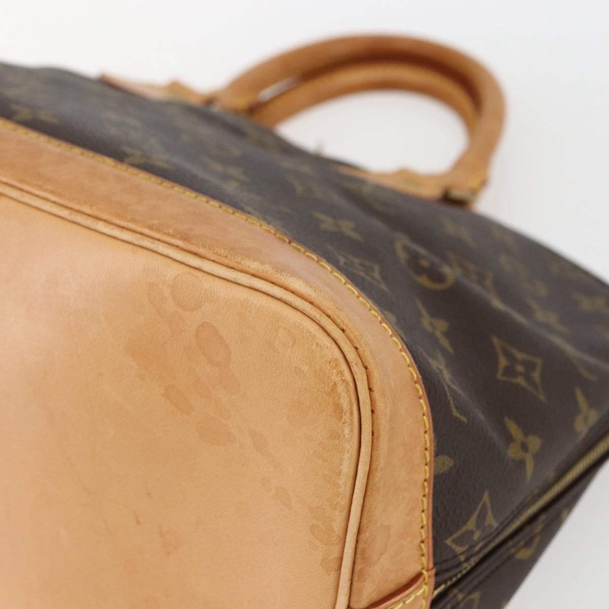 Louis Vuitton Alma Handbag Monogram Canvas Brown Canvas Handbag (Pre-Owned)