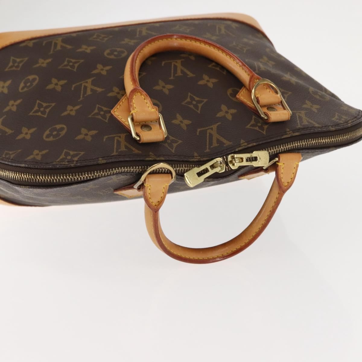 Louis Vuitton Alma Handbag Monogram Canvas Brown Canvas Handbag (Pre-Owned)