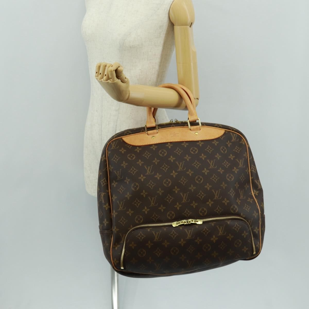 Louis Vuitton Evasion Travel Bag Monogram Canvas Brown Canvas Travel Bag Bag (Pre-Owned)