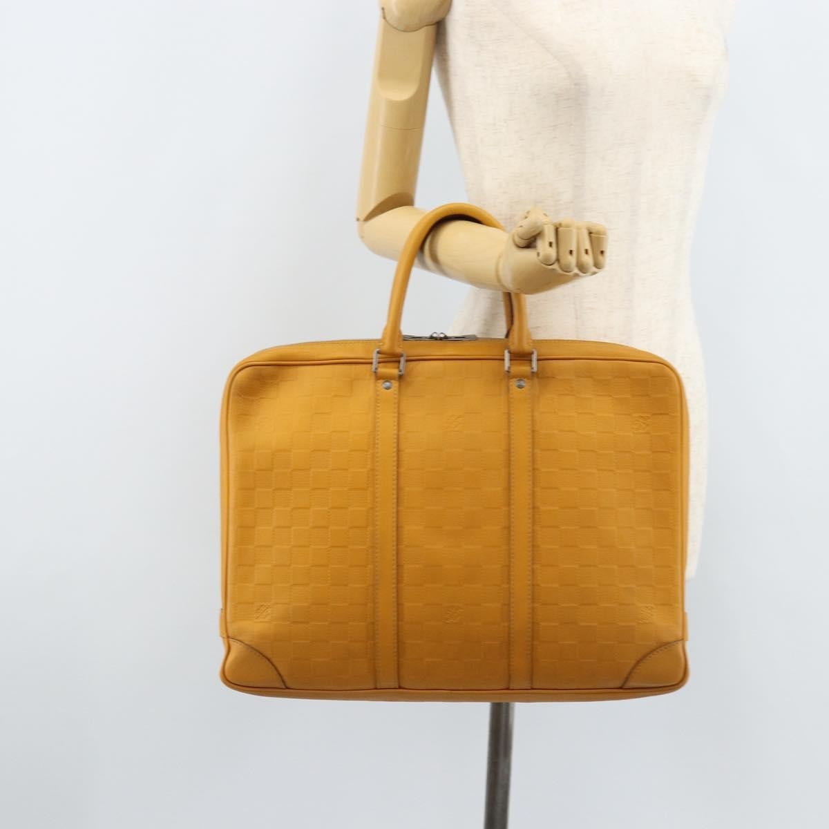Louis Vuitton Porte-Documents Voyage Briefcase Damier Infini Leather Yellow Leather Briefcase Bag (Pre-Owned)