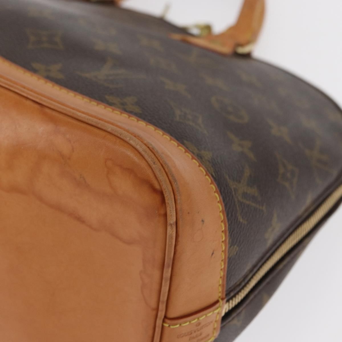 Louis Vuitton Alma Handbag Monogram Canvas Brown Canvas Handbag (Pre-Owned)