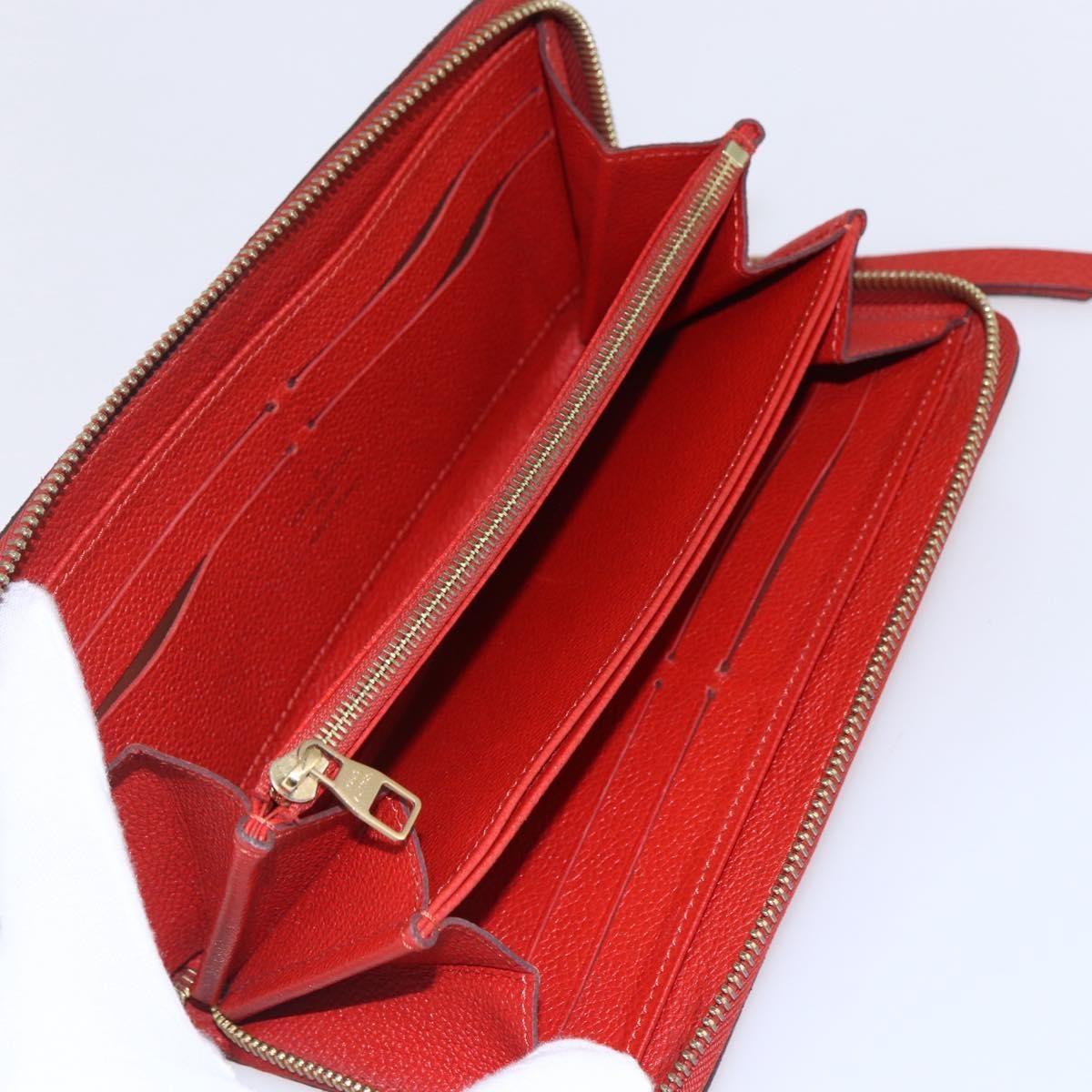 Louis Vuitton Portefeuille Zippy Monogramme Empreinte Monogramme Empreinte Red Leather Wallets Accessory (Pre-Owned)
