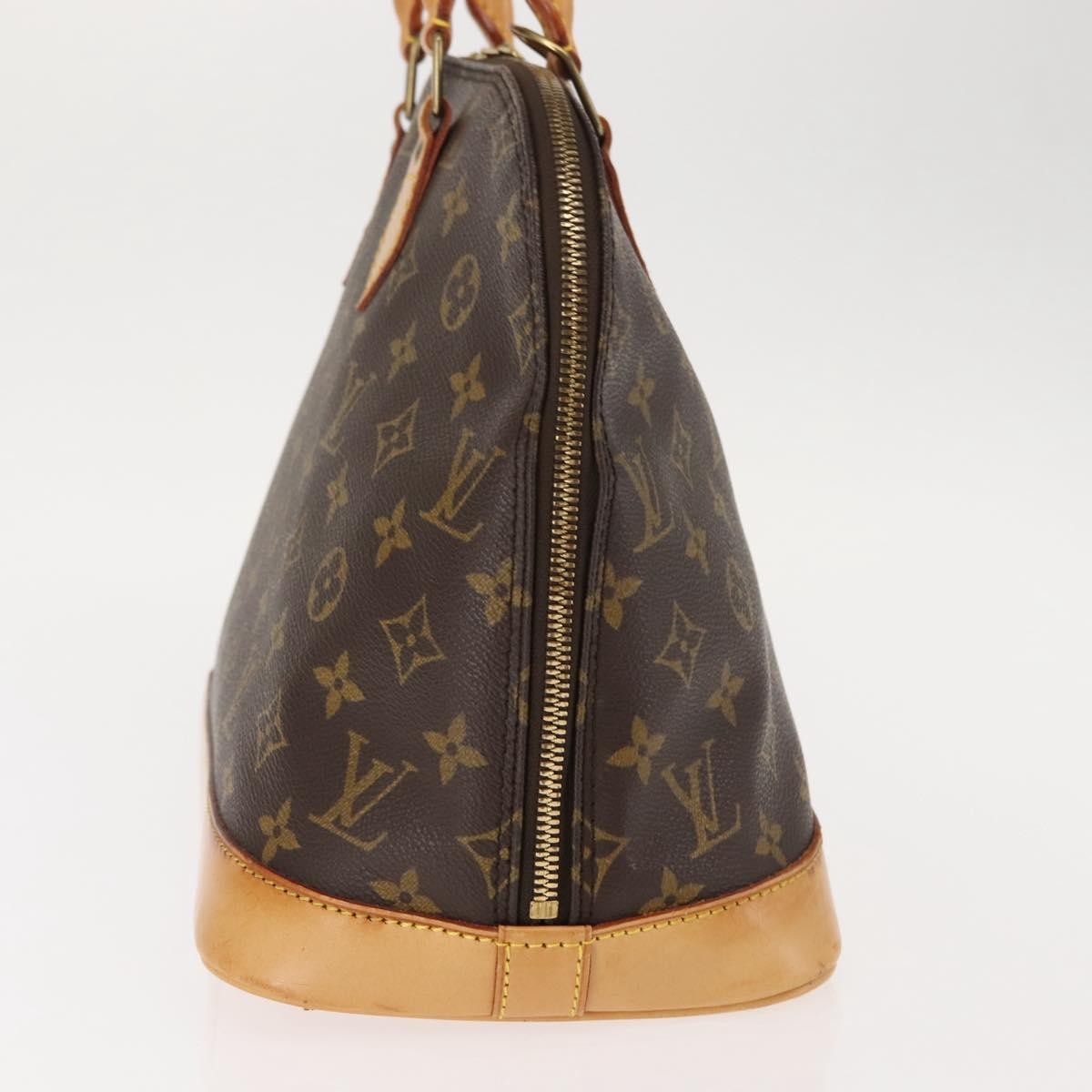 Louis Vuitton Alma Handbag Monogram Canvas Brown Canvas Handbag (Pre-Owned)