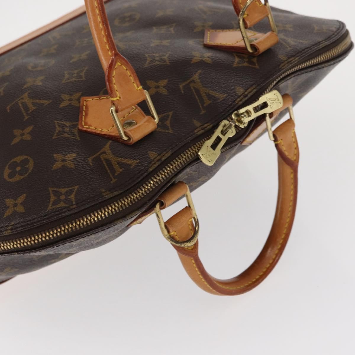 Louis Vuitton Alma Handbag Monogram Canvas Brown Canvas Handbag (Pre-Owned)
