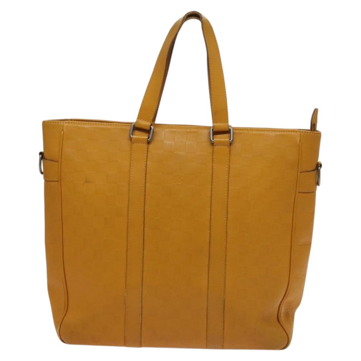 Louis Vuitton Tadao Handbag Damier Infini Leather Yellow Leather Handbag (Pre-Owned)
