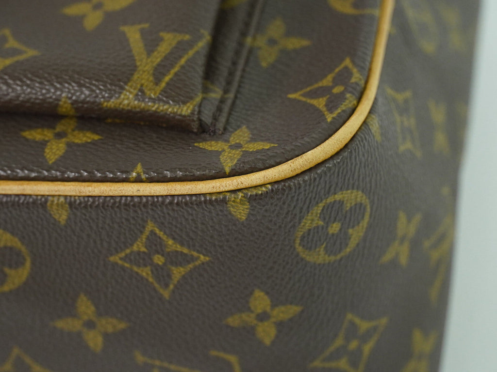 Louis Vuitton Excentri-Cite Handbag Monogram Canvas Brown Canvas Handbag (Pre-Owned)