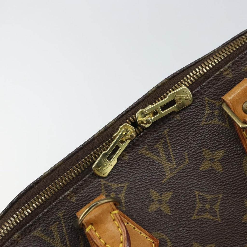 Louis Vuitton Alma Handbag Monogram Canvas Brown Canvas Handbag (Pre-Owned)
