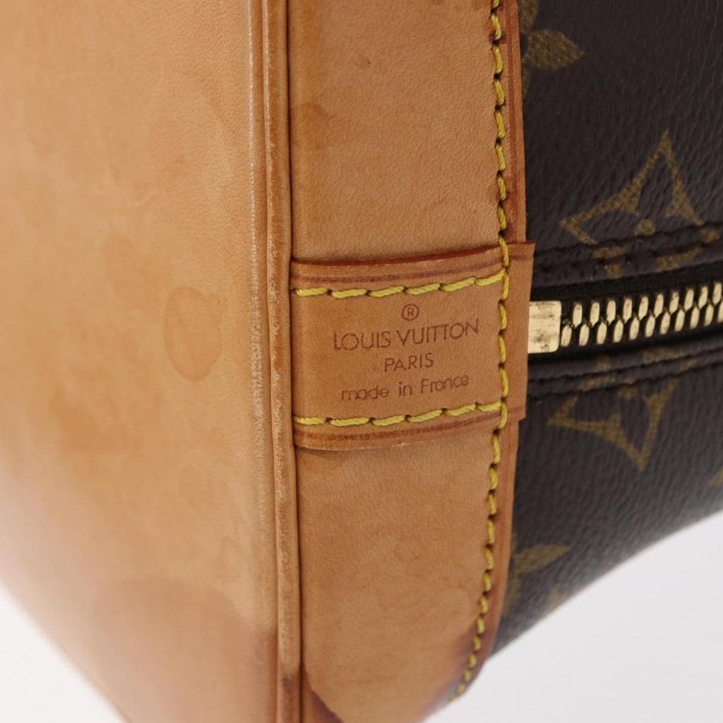 Louis Vuitton Alma Handbag Monogram Canvas Brown Canvas Handbag (Pre-Owned)