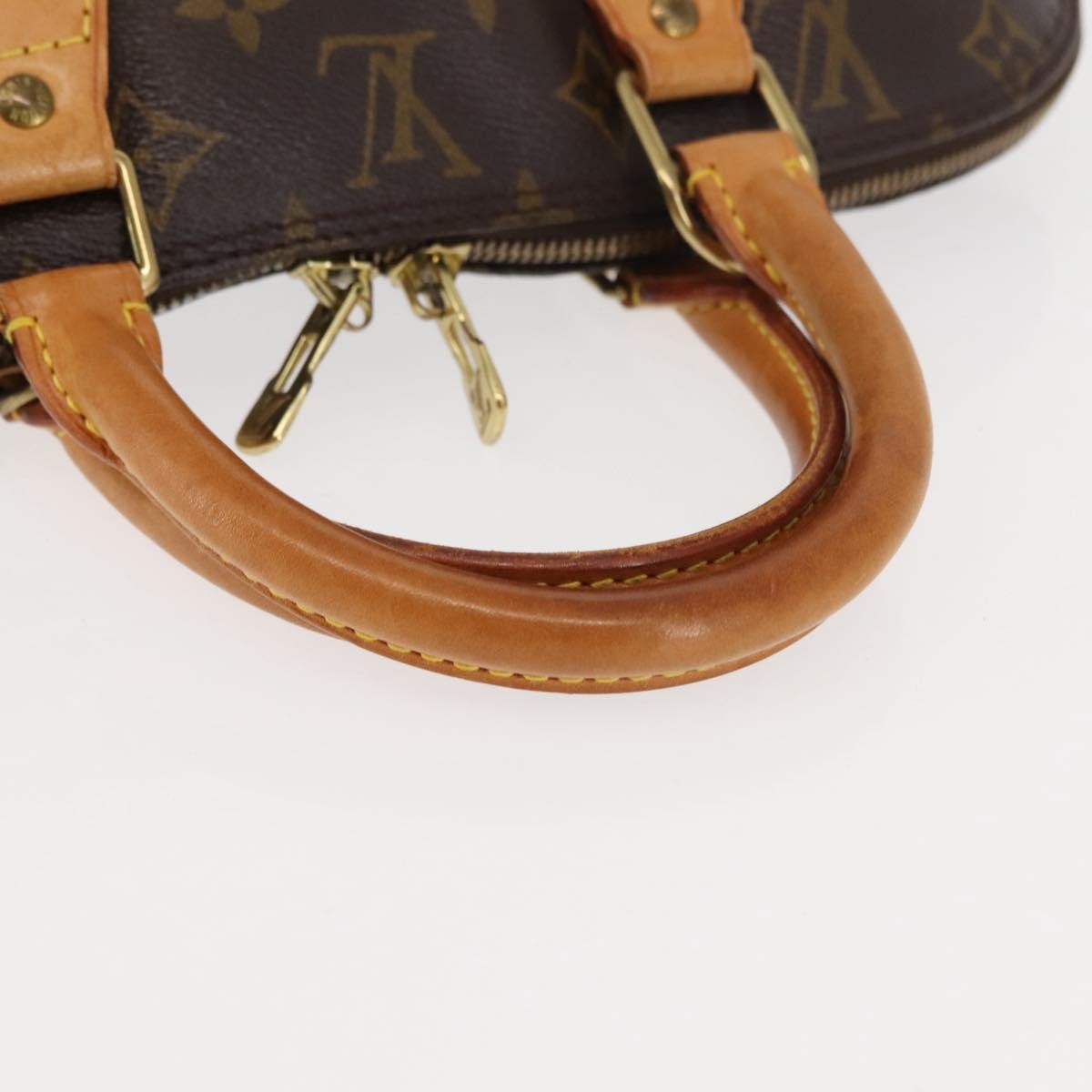 Louis Vuitton Alma Handbag Monogram Canvas Brown Canvas Handbag (Pre-Owned)