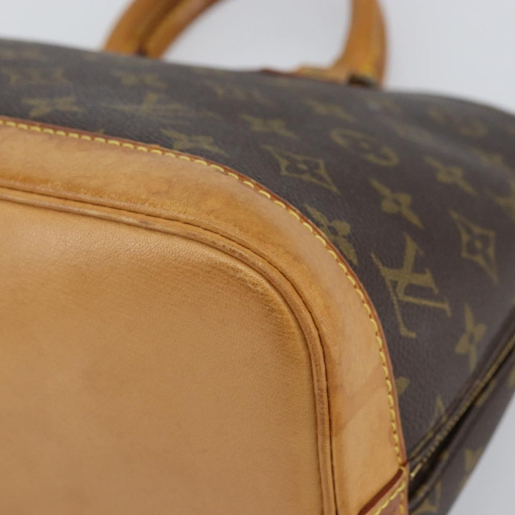 Louis Vuitton Alma Handbag Monogram Canvas Brown Canvas Handbag (Pre-Owned)