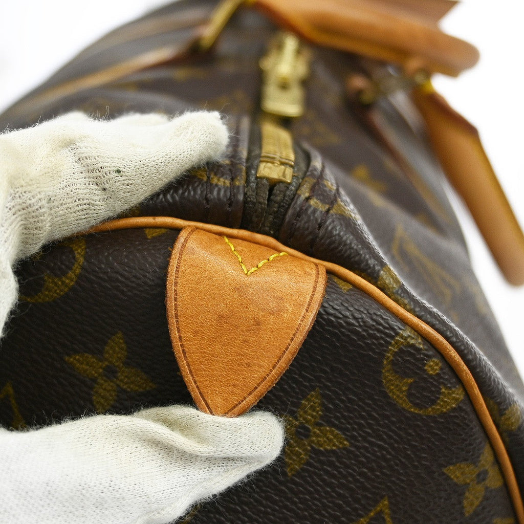 Louis Vuitton Keepall Bag Monogram Canvas Brown Canvas Travel Bag Bag (Pre-Owned)