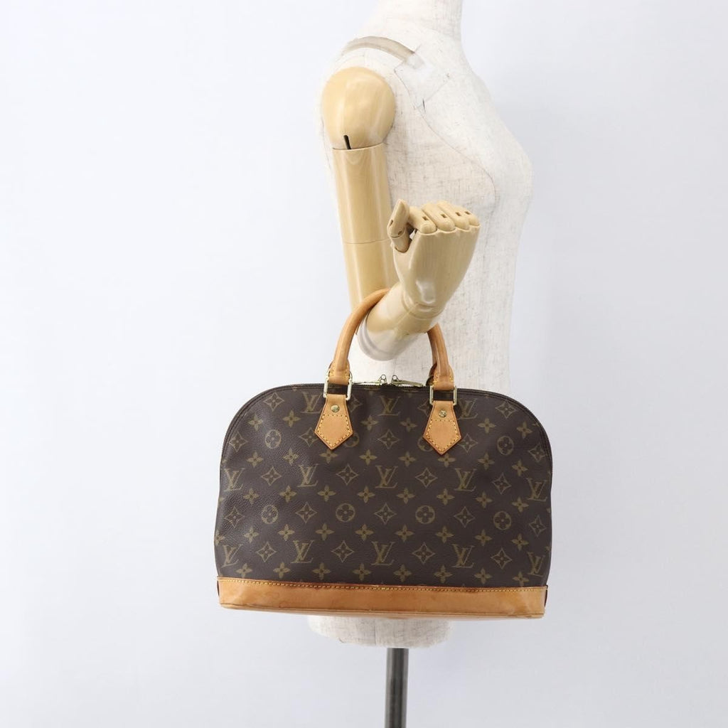 Louis Vuitton Alma Handbag Monogram Canvas Brown Canvas Handbag (Pre-Owned)