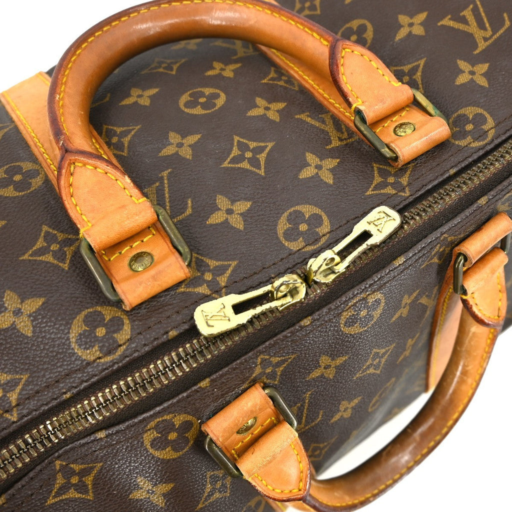 Louis Vuitton Keepall Bag Monogram Canvas Brown Canvas Travel Bag Bag (Pre-Owned)