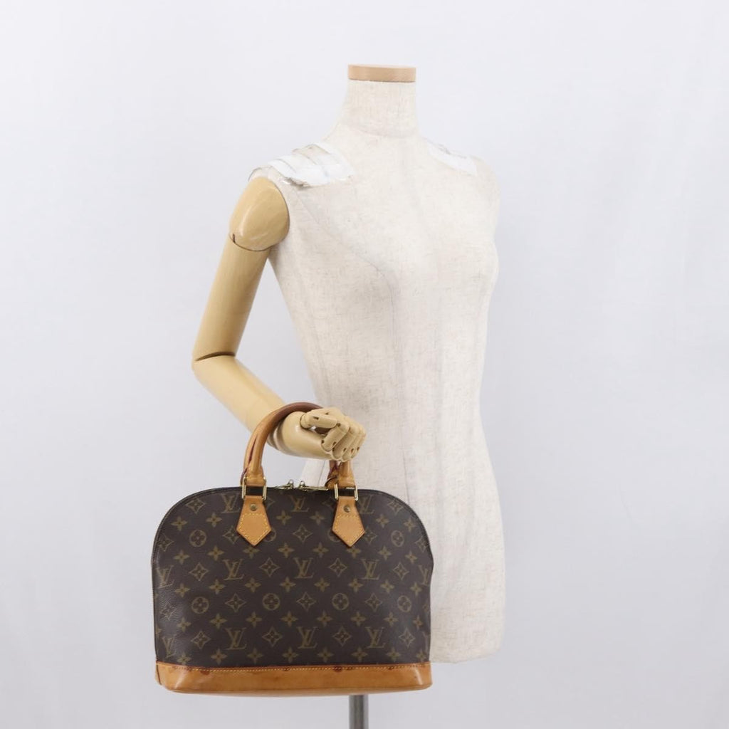 Louis Vuitton Alma Handbag Monogram Canvas Brown Canvas Handbag (Pre-Owned)