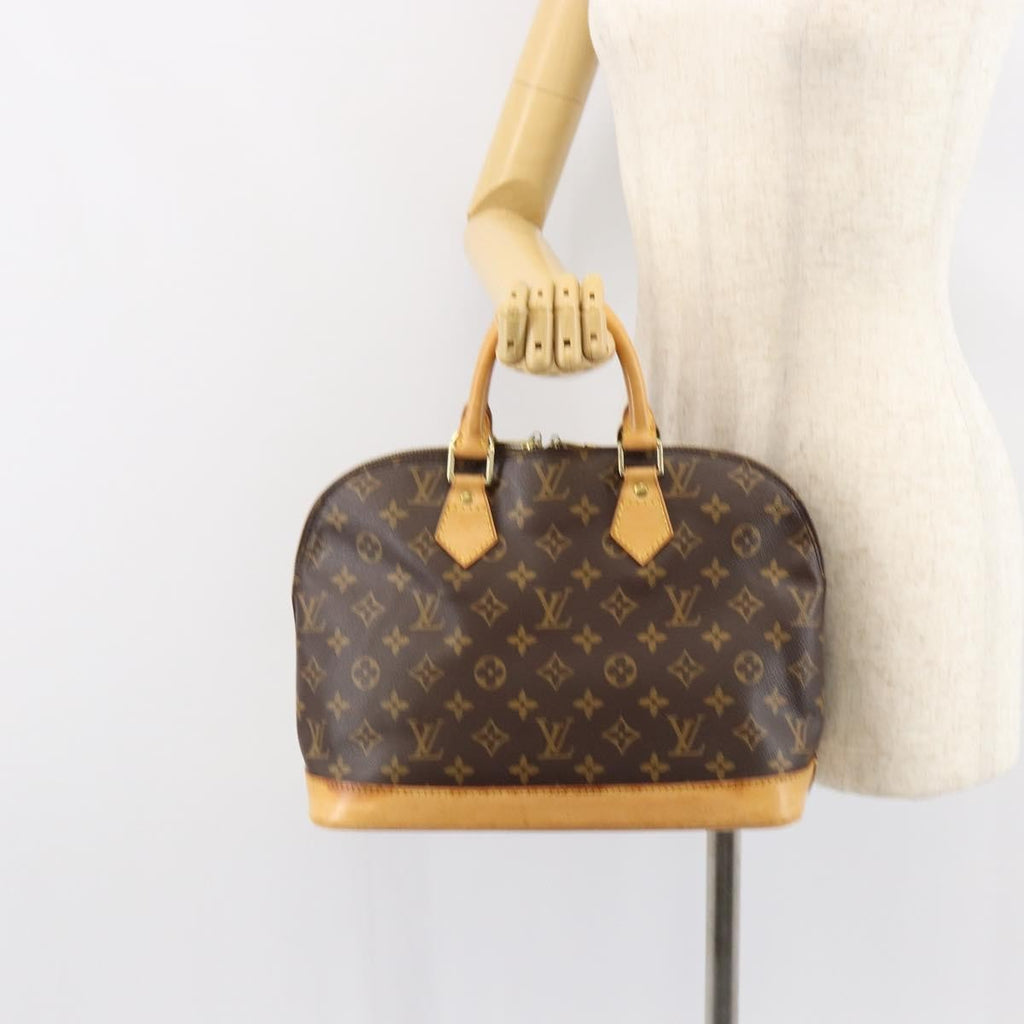 Louis Vuitton Alma Handbag Monogram Canvas Brown Canvas Handbag (Pre-Owned)
