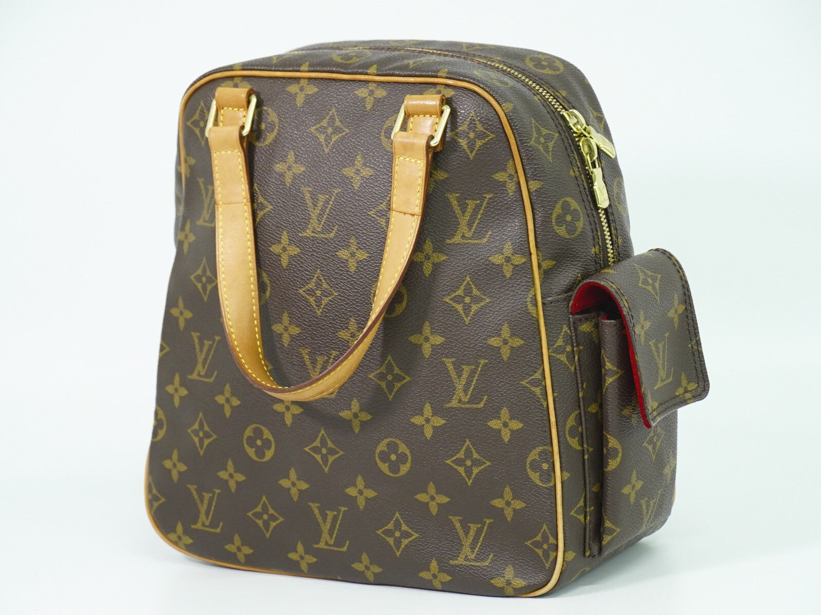 Louis Vuitton Excentri-Cite Handbag Monogram Canvas Brown Canvas Handbag (Pre-Owned)