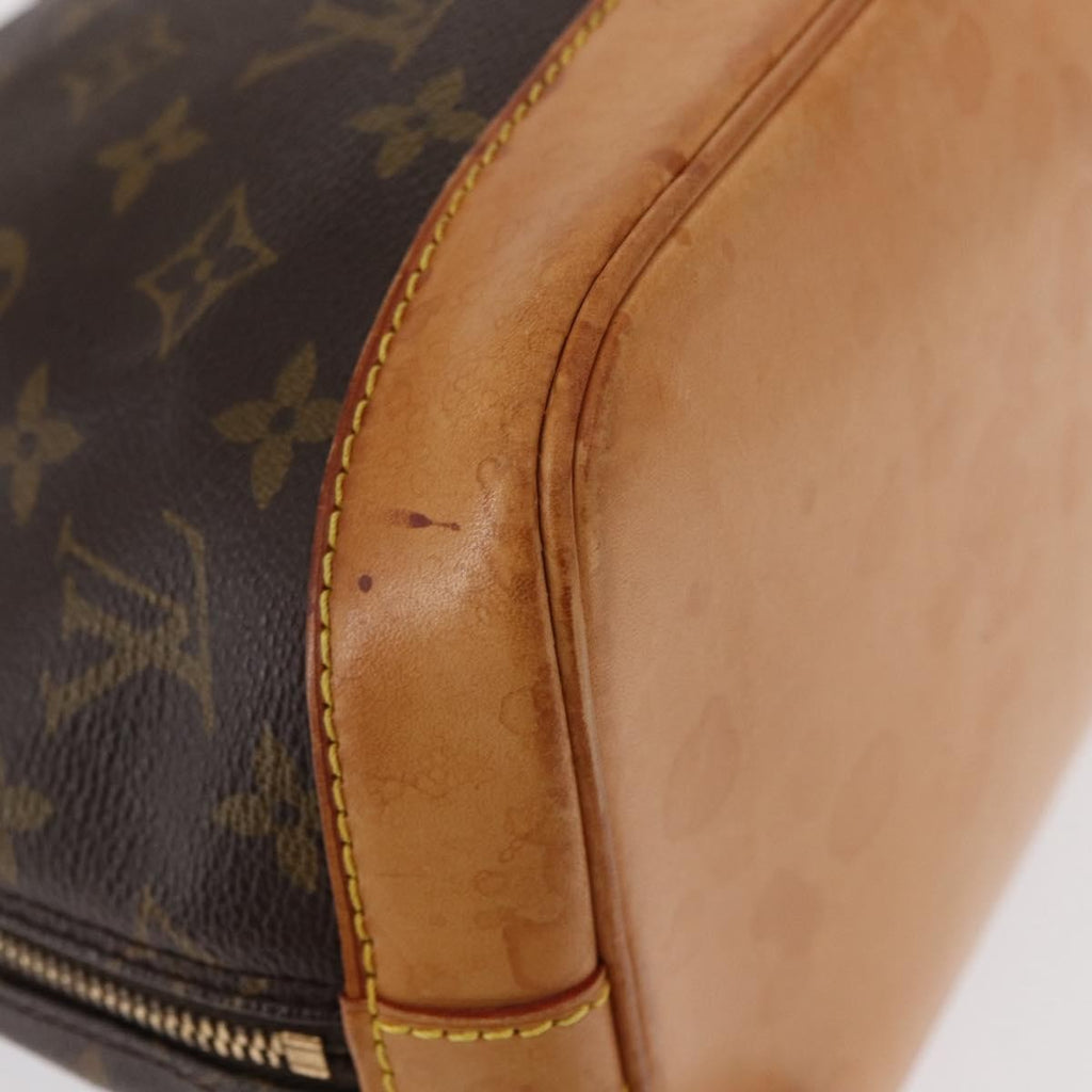 Louis Vuitton Alma Handbag Monogram Canvas Brown Canvas Handbag (Pre-Owned)