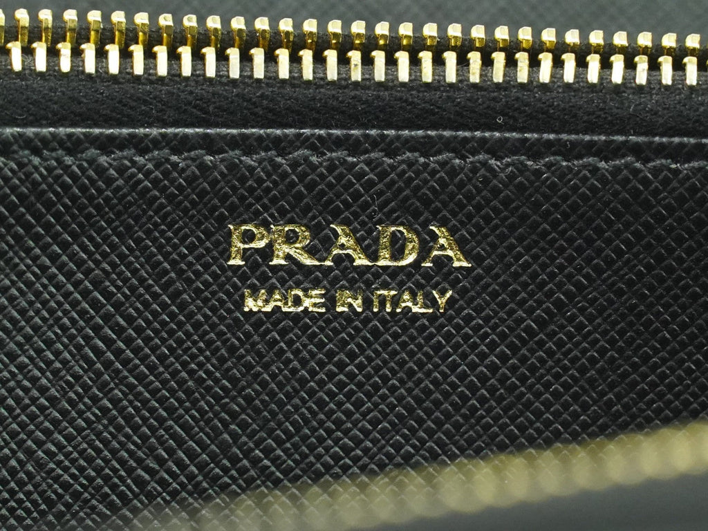Prada Zip Around Tab Wallet Saffiano Leather Black Leather Wallets Accessory (Pre-Owned)