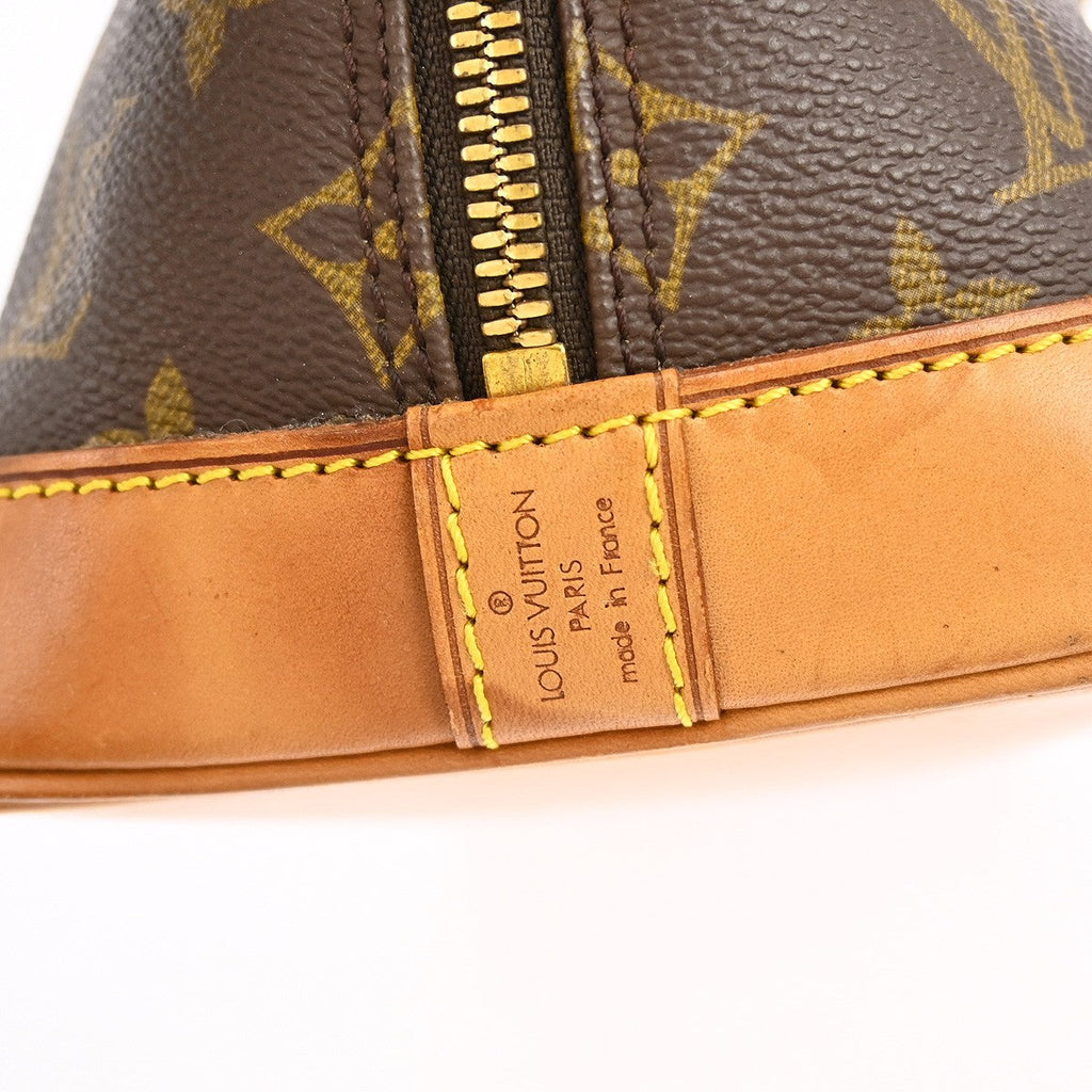 Louis Vuitton Alma Handbag Monogram Canvas Brown Canvas Handbag (Pre-Owned)