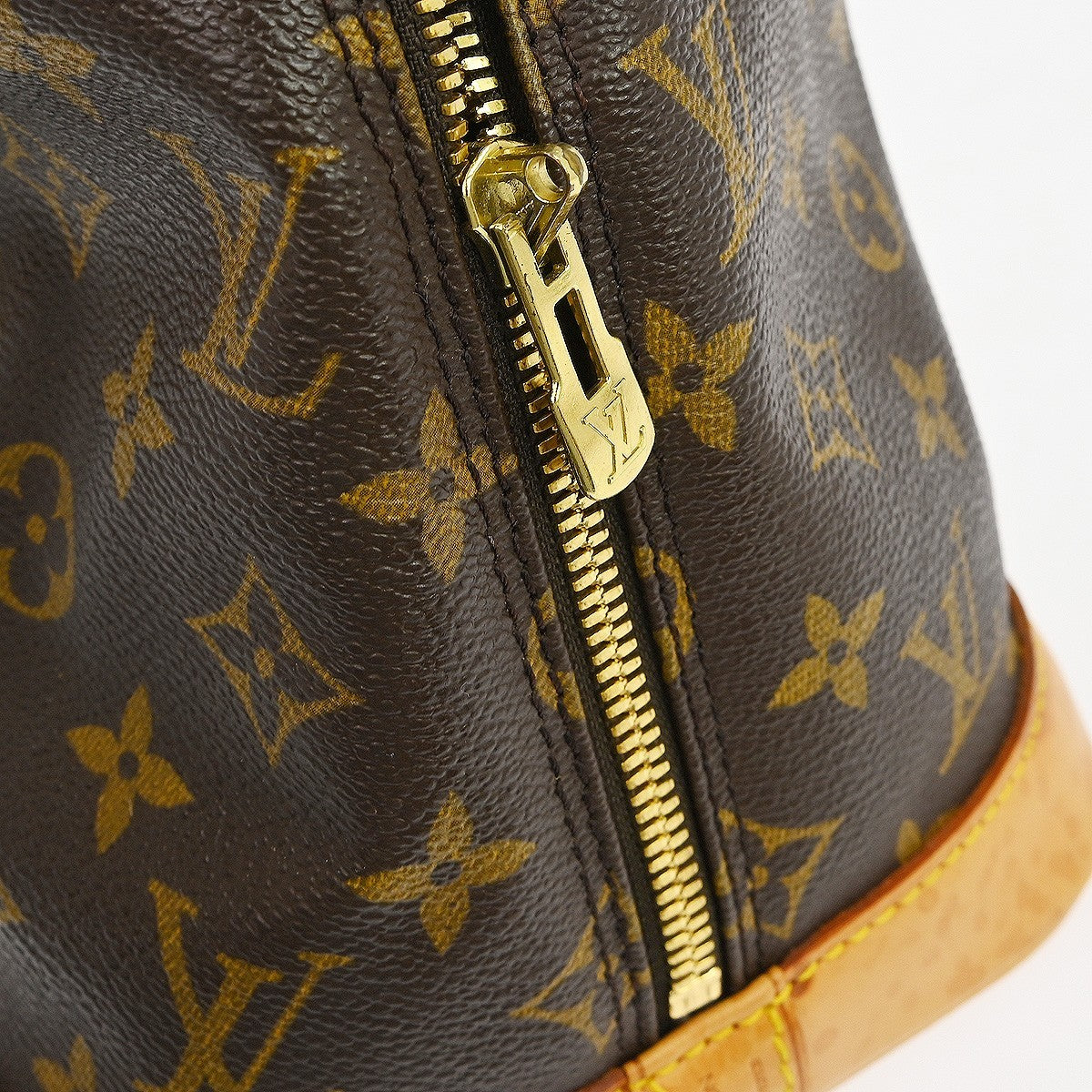 Louis Vuitton Alma Handbag Monogram Canvas Brown Canvas Handbag (Pre-Owned)