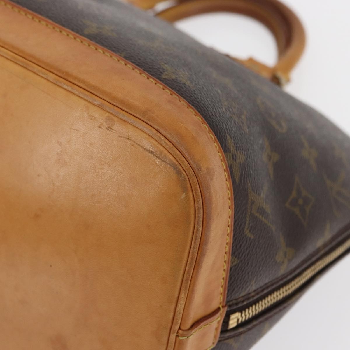 Louis Vuitton Alma Handbag Monogram Canvas Brown Canvas Handbag (Pre-Owned)