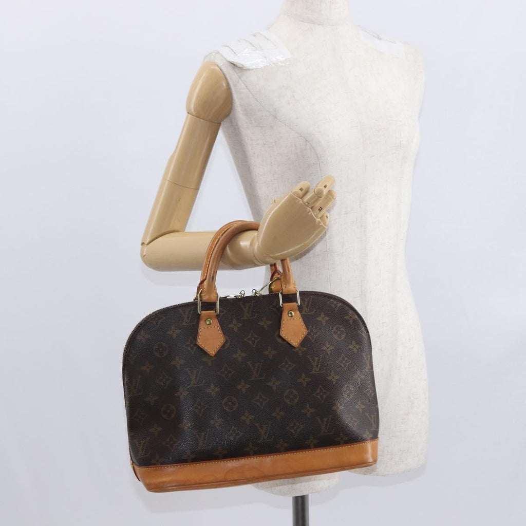 Louis Vuitton Alma Handbag Monogram Canvas Brown Canvas Handbag (Pre-Owned)