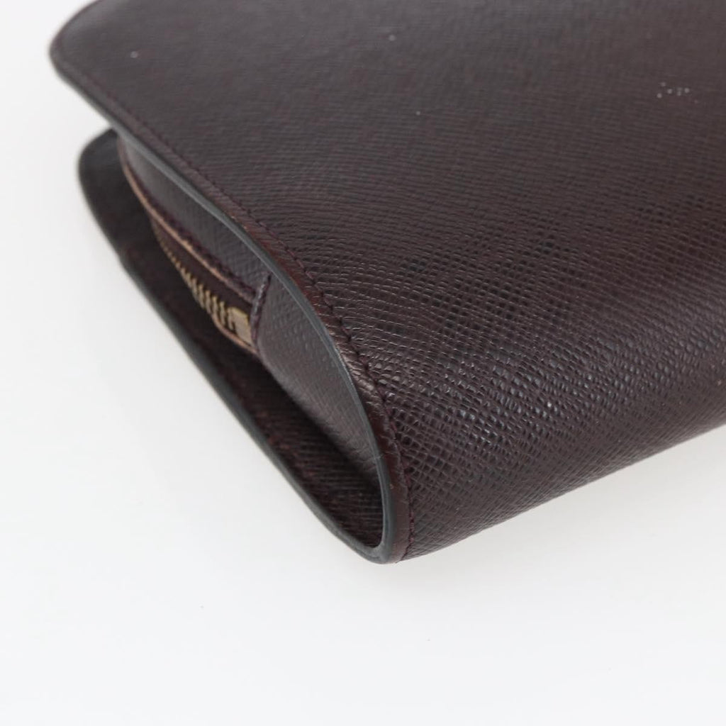 Louis Vuitton Pochette Baikal Clutch Taiga Leather Burgundy Leather Clutche & Pouche Bag (Pre-Owned)