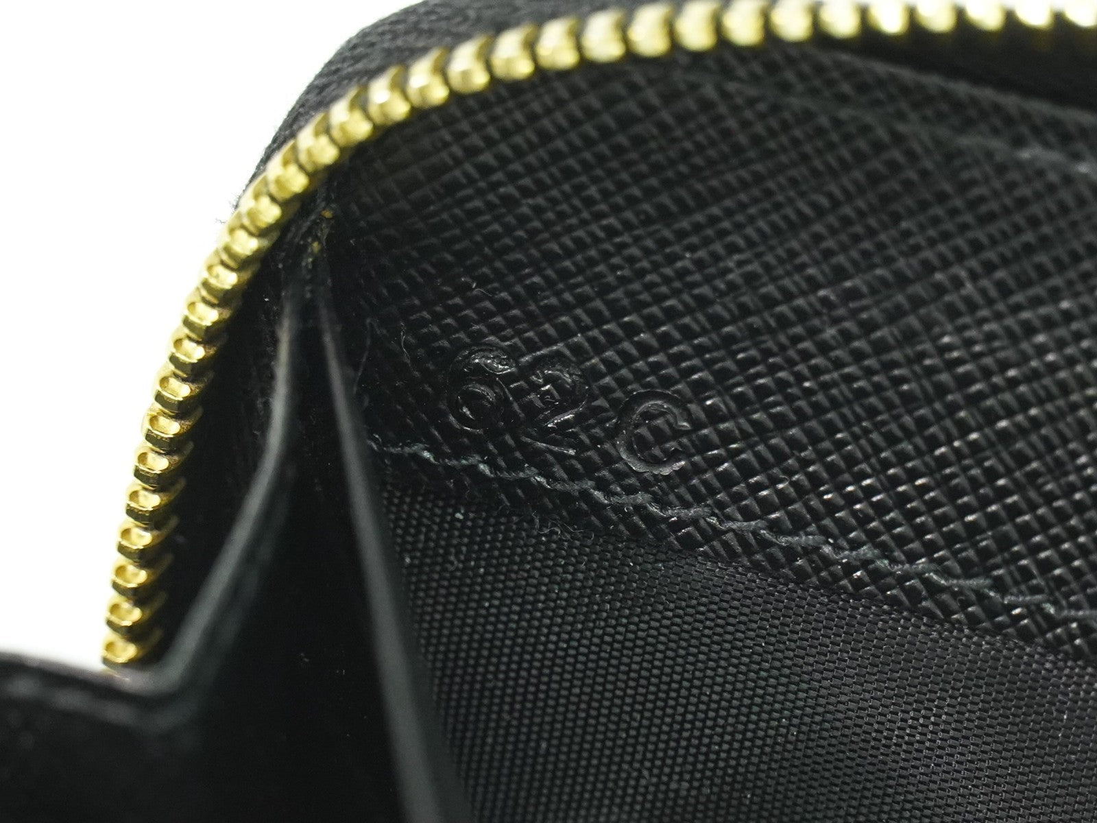 Prada Zip Around Tab Wallet Saffiano Leather Black Leather Wallets Accessory (Pre-Owned)