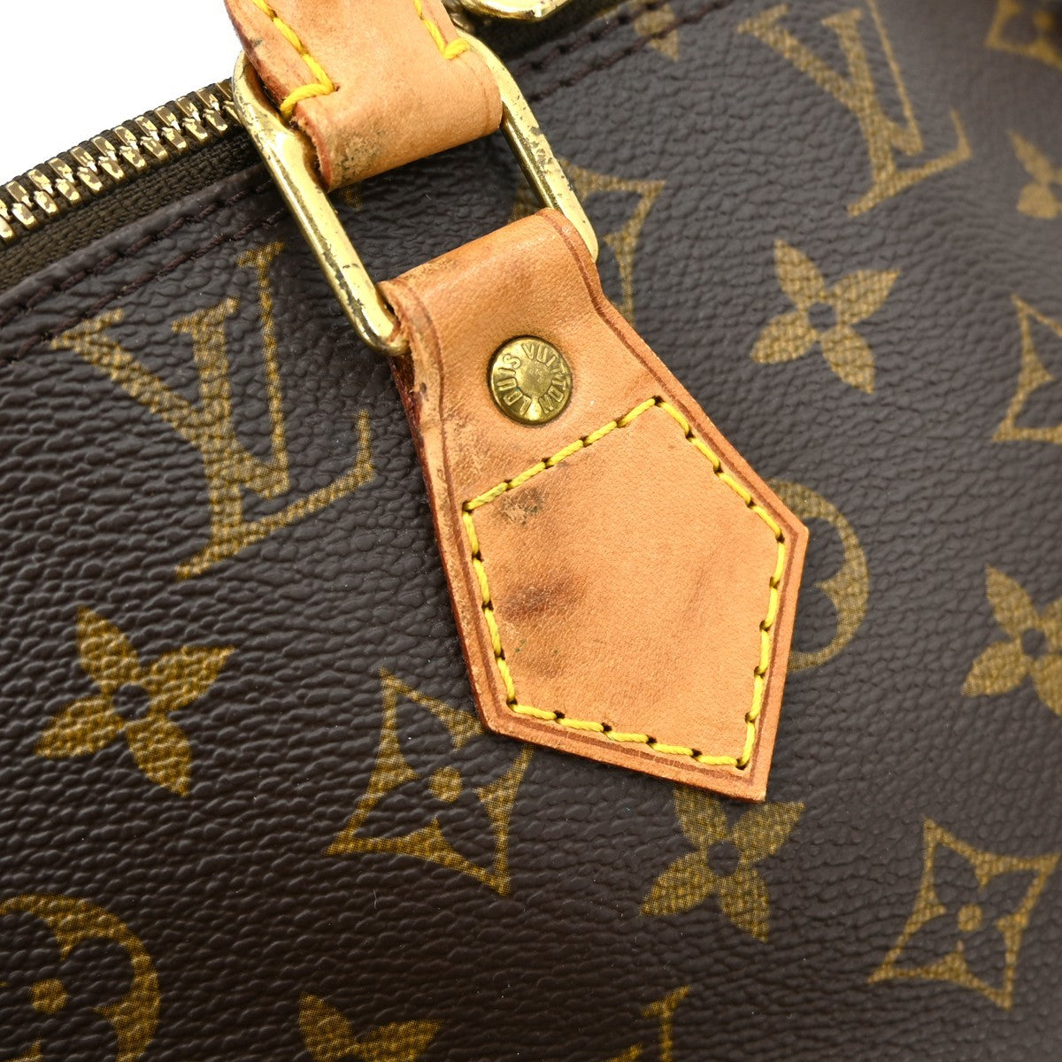 Louis Vuitton Alma Handbag Monogram Canvas Brown Canvas Handbag (Pre-Owned)