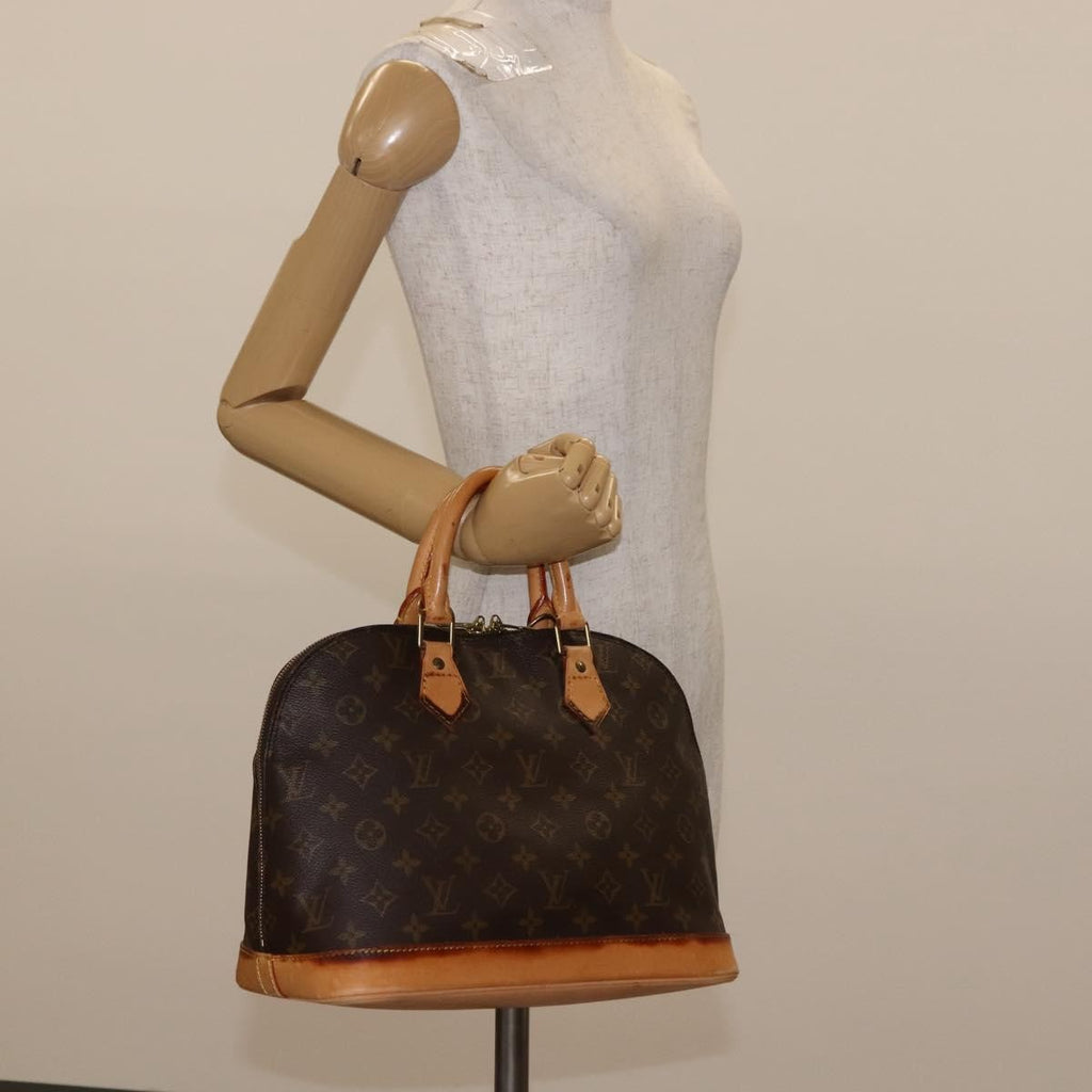 Louis Vuitton Alma Handbag Monogram Canvas Brown Canvas Handbag (Pre-Owned)