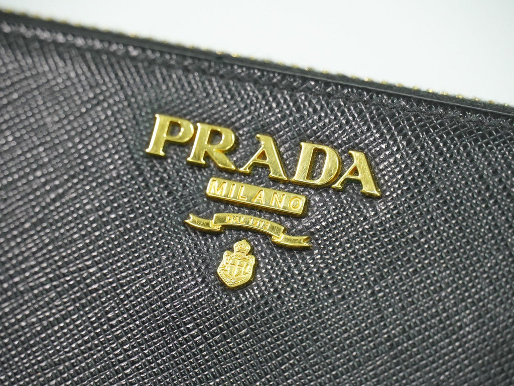 Prada Zip Around Tab Wallet Saffiano Leather Black Leather Wallets Accessory (Pre-Owned)