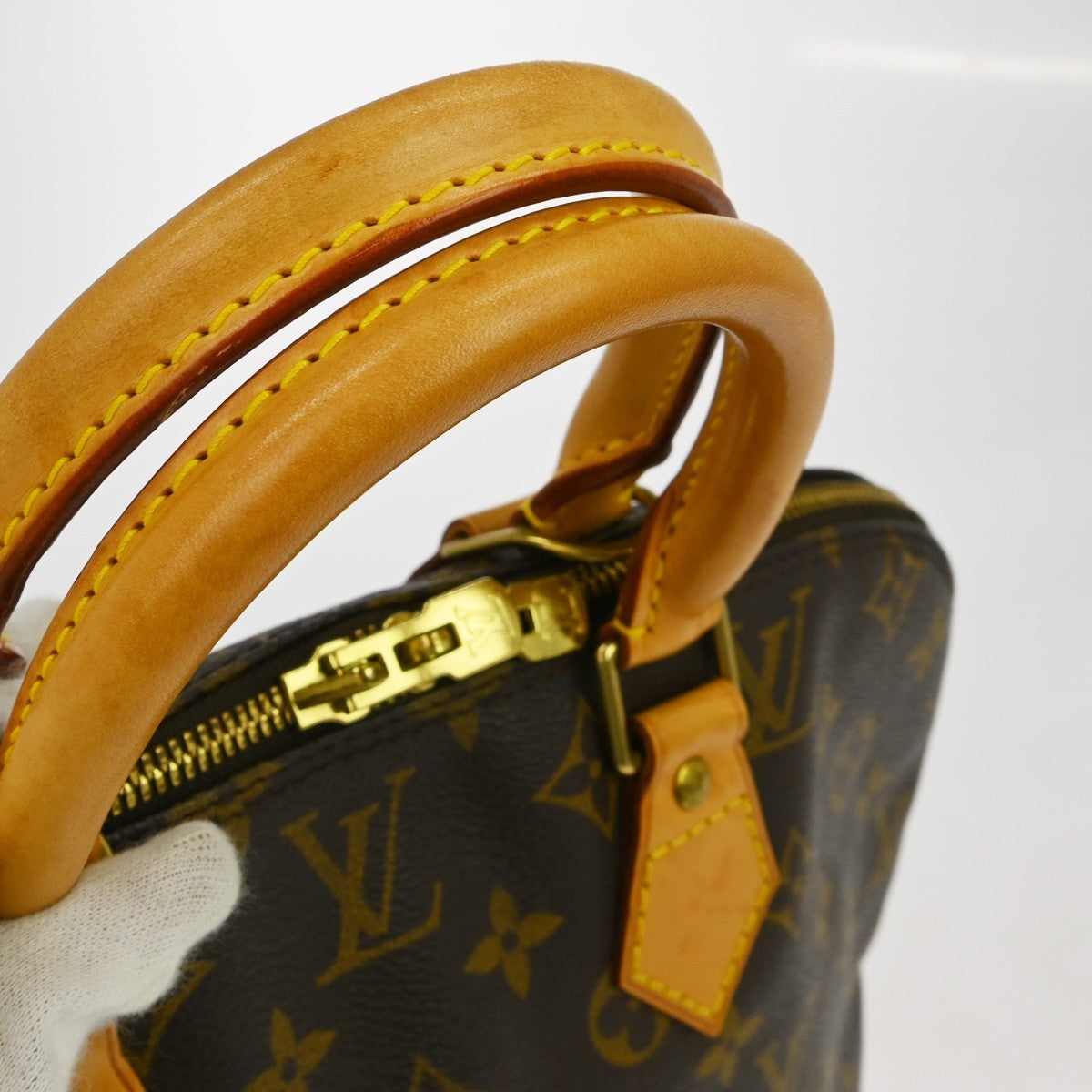 Louis Vuitton Alma Handbag Monogram Canvas Brown Canvas Handbag (Pre-Owned)