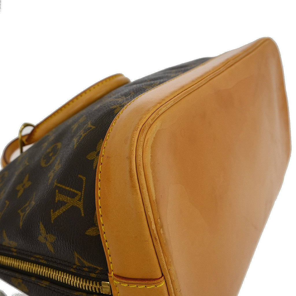 Louis Vuitton Alma Handbag Monogram Canvas Brown Canvas Handbag (Pre-Owned)