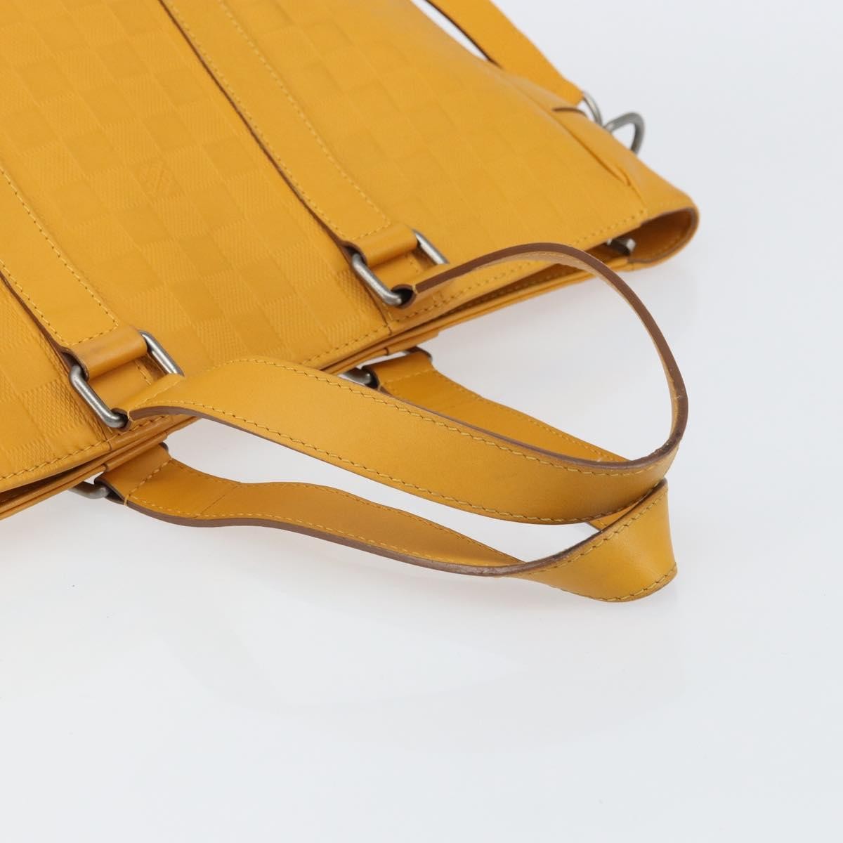 Louis Vuitton Tadao Handbag Damier Infini Leather Yellow Leather Handbag (Pre-Owned)