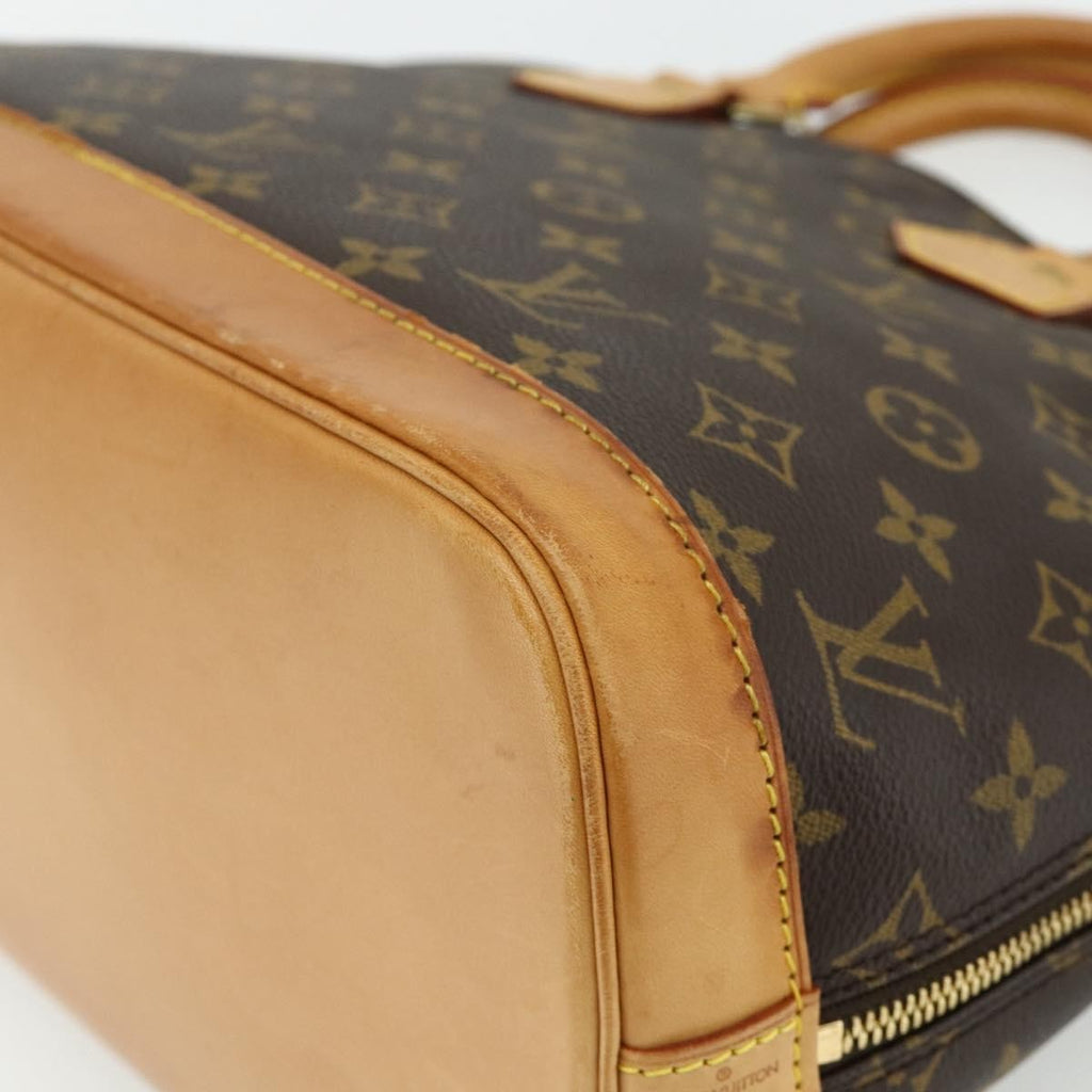 Louis Vuitton Alma Handbag Monogram Canvas Brown Canvas Handbag (Pre-Owned)