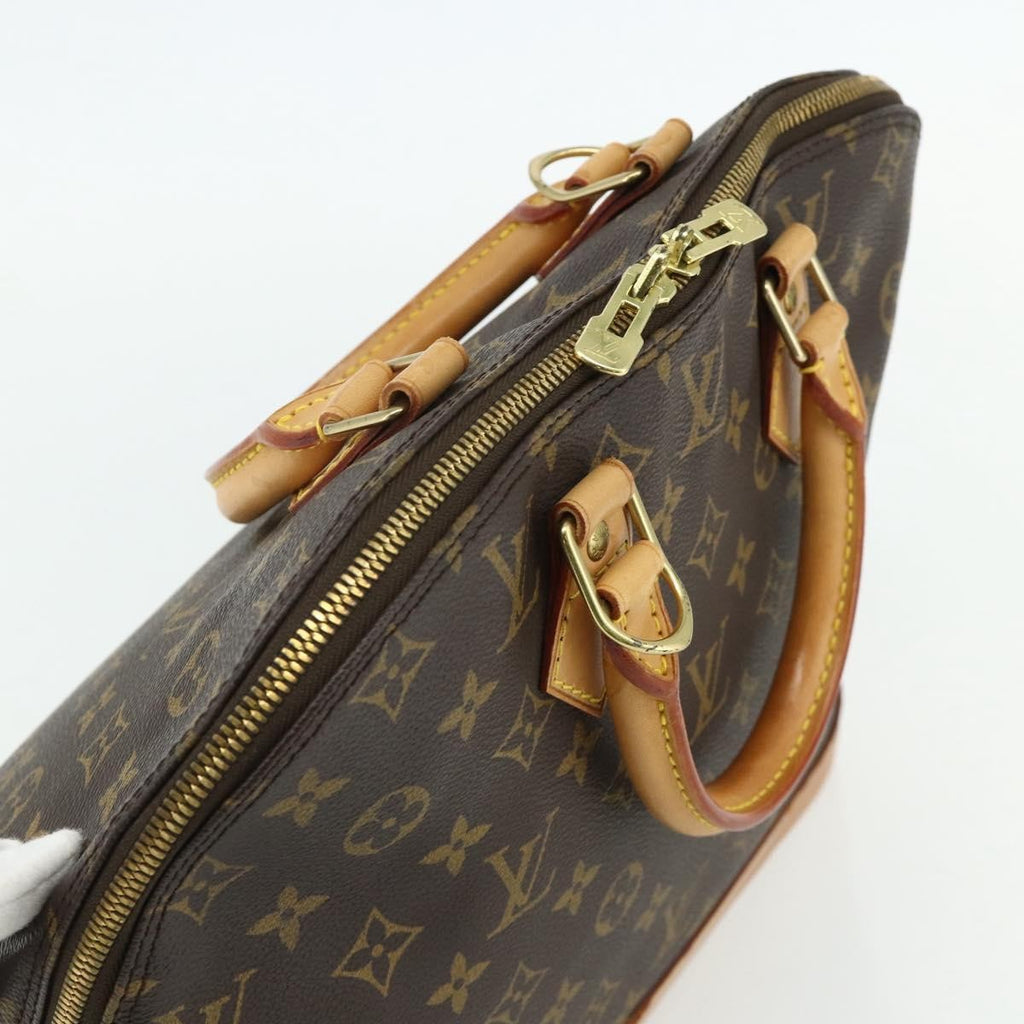 Louis Vuitton Alma Handbag Monogram Canvas Brown Canvas Handbag (Pre-Owned)