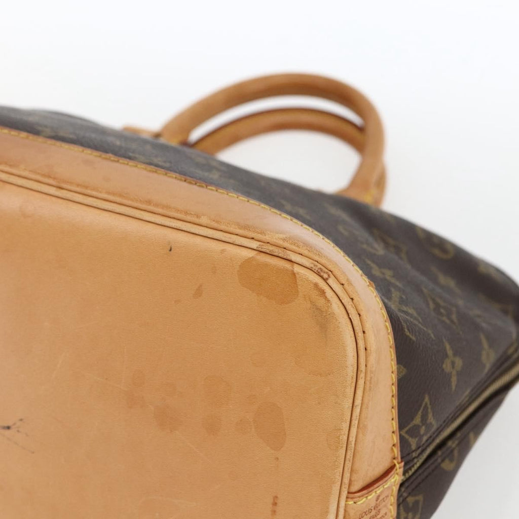 Louis Vuitton Alma Handbag Monogram Canvas Brown Canvas Handbag (Pre-Owned)
