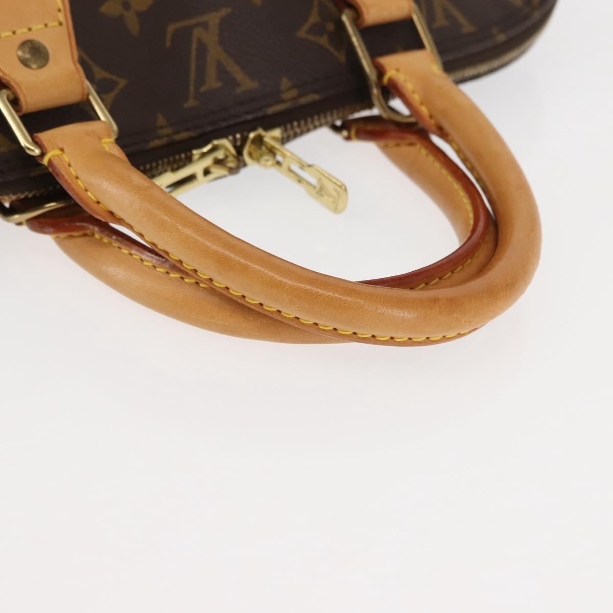 Louis Vuitton Alma Handbag Monogram Canvas Brown Canvas Handbag (Pre-Owned)