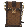 Louis Vuitton Vertical Trunk Pochette Reverse Monogram Canvas Brown Canvas Clutche & Pouche Bag (Pre-Owned)