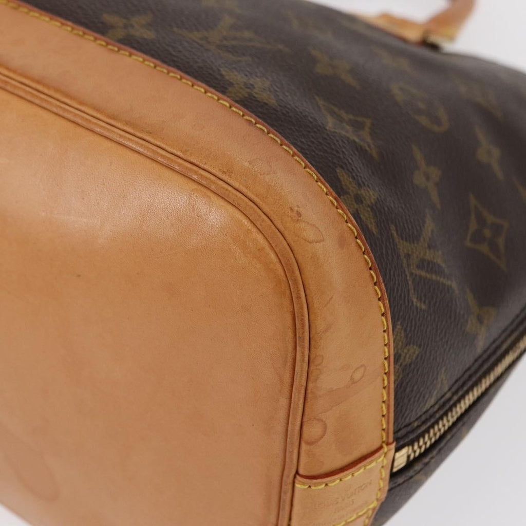 Louis Vuitton Alma Handbag Monogram Canvas Brown Canvas Handbag (Pre-Owned)