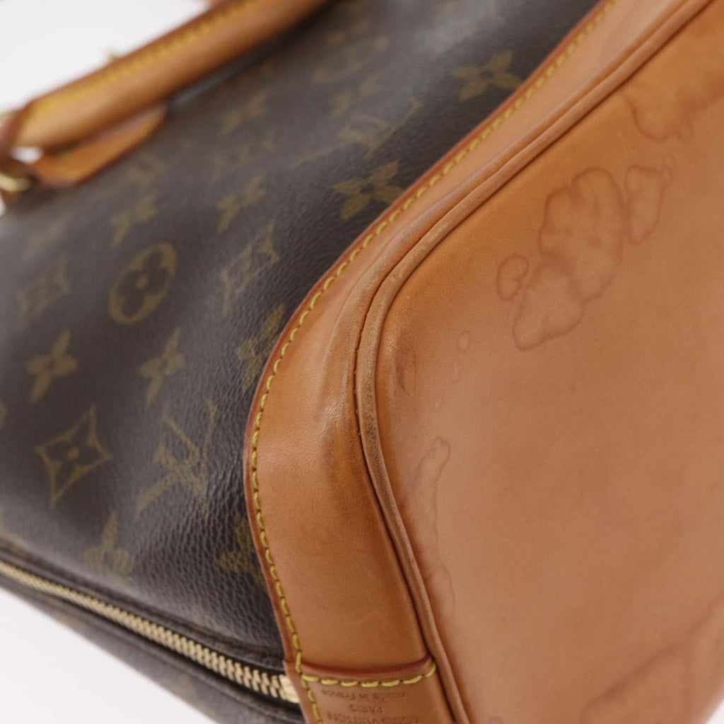 Louis Vuitton Alma Handbag Monogram Canvas Brown Canvas Handbag (Pre-Owned)