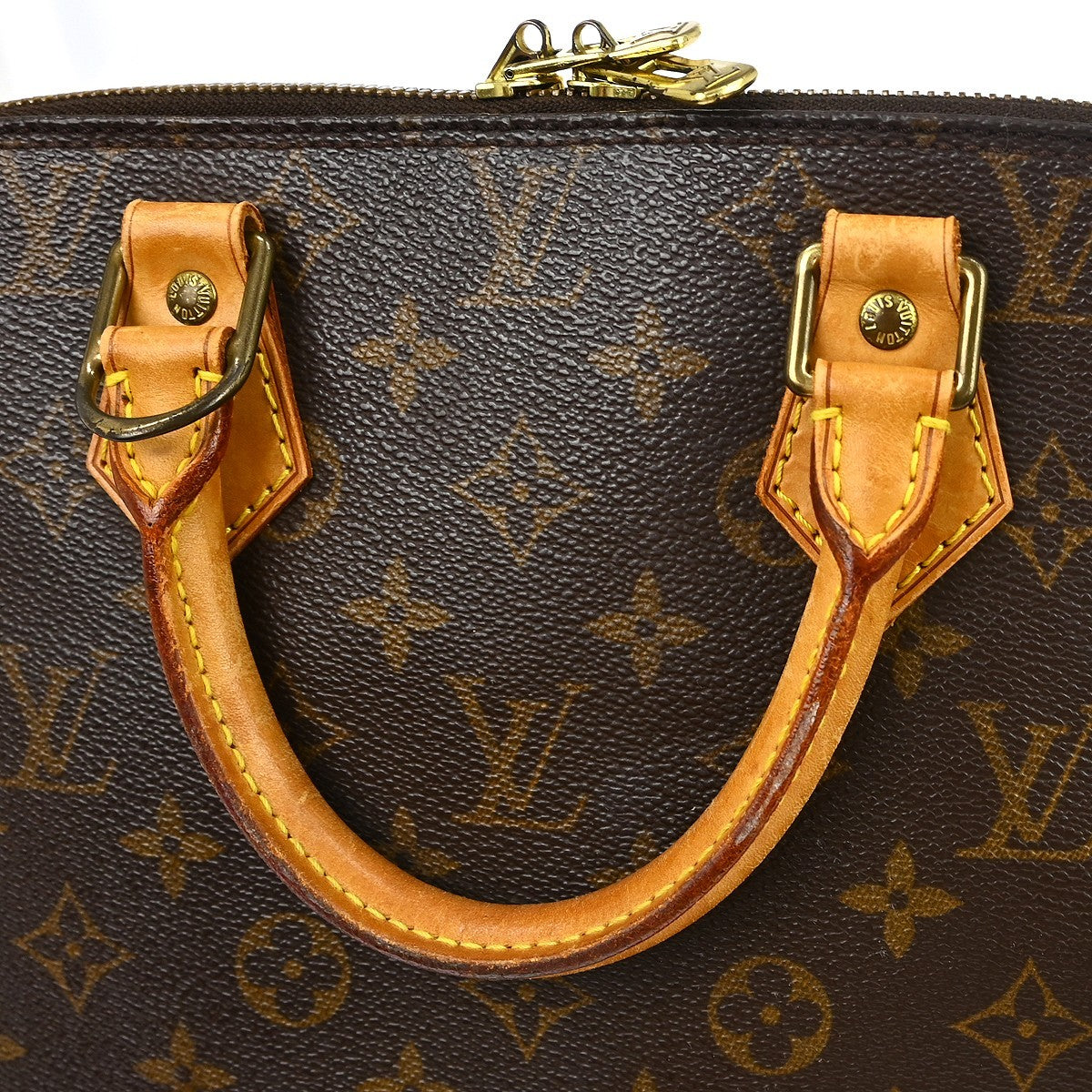 Louis Vuitton Alma Handbag Monogram Canvas Brown Canvas Handbag (Pre-Owned)