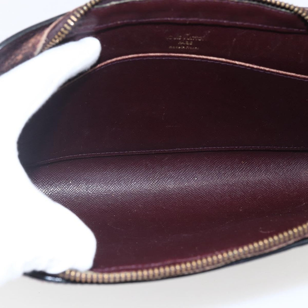 Louis Vuitton Pochette Baikal Clutch Taiga Leather Burgundy Leather Clutche & Pouche Bag (Pre-Owned)
